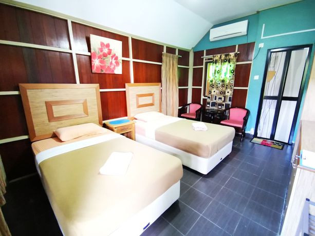 Imagen de la habitación del Hotel OYO 90038 Dalyla Inn Chalet. Foto 8