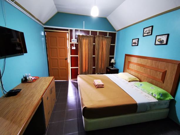 Imagen de la habitación del Hotel OYO 90038 Dalyla Inn Chalet. Foto 15