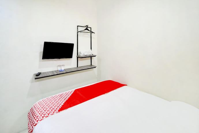 Imagen de la habitación del Hotel OYO 90048 Teratai Bekasi Guesthouse. Foto 3
