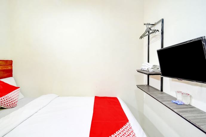 Imagen de la habitación del Hotel OYO 90048 Teratai Bekasi Guesthouse. Foto 6