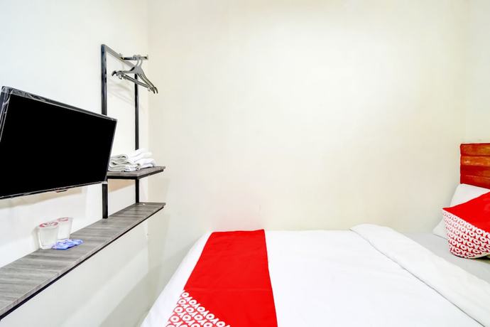 Imagen de la habitación del Hotel OYO 90048 Teratai Bekasi Guesthouse. Foto 7
