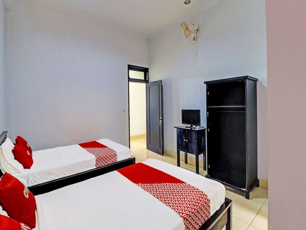 Imagen de la habitación del Hotel OYO 90067 Nuansa Indah. Foto 5