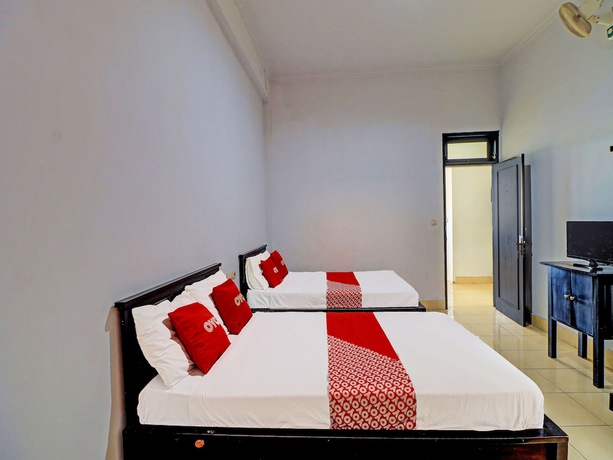 Imagen de la habitación del Hotel OYO 90067 Nuansa Indah. Foto 6