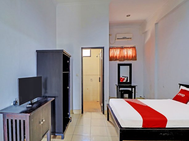 Imagen de la habitación del Hotel OYO 90067 Nuansa Indah. Foto 8