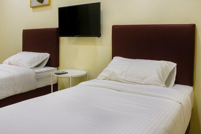 Imagen general del Hotel OYO 90090 Roselyn Inn 2. Foto 1