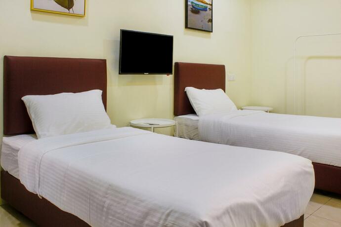 Imagen general del Hotel OYO 90090 Roselyn Inn 2. Foto 12