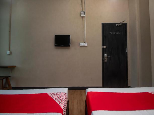 Imagen de la habitación del Hotel OYO 90094 Hi Inn 3. Foto 1