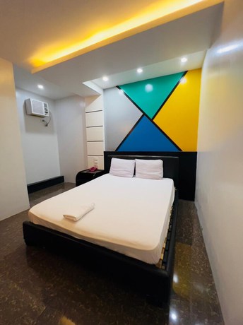 Imagen de la habitación del Hotel OYO 901 Ranchotel Tunasan. Foto 4
