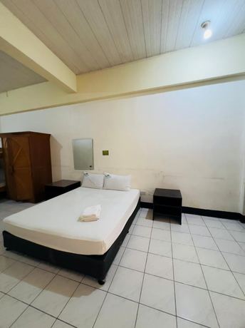 Imagen de la habitación del Hotel OYO 901 Ranchotel Tunasan. Foto 7