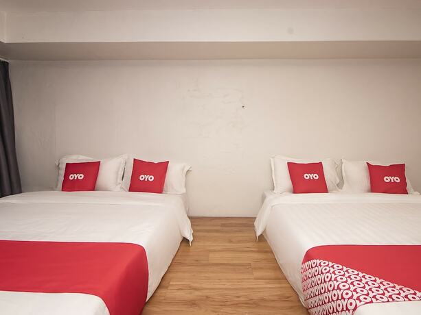 Imagen de la habitación del Hotel OYO 90105 Towermas Hotel. Foto 2