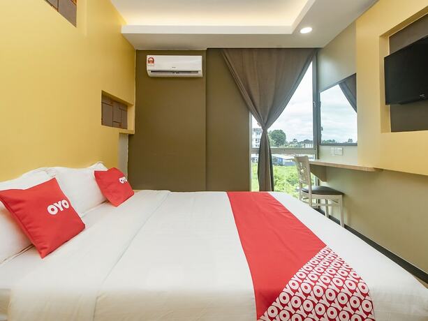 Imagen de la habitación del Hotel OYO 90105 Towermas Hotel. Foto 4