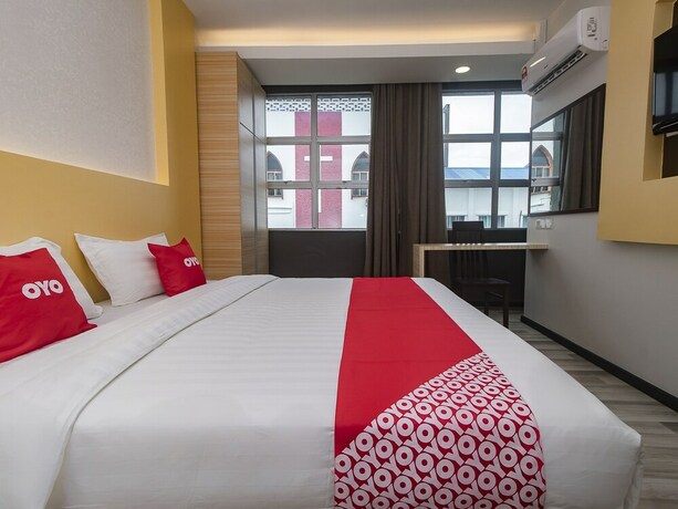 Imagen de la habitación del Hotel OYO 90105 Towermas Hotel. Foto 11