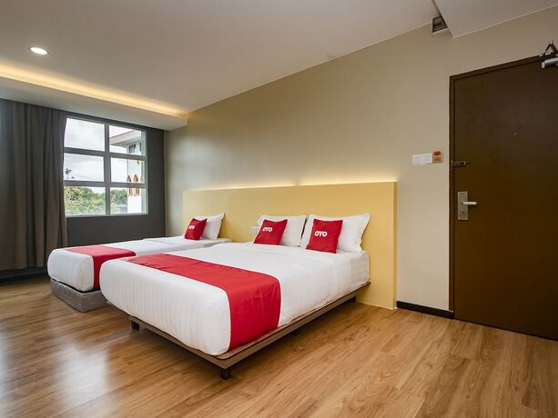 Imagen de la habitación del Hotel OYO 90105 Towermas Hotel. Foto 12