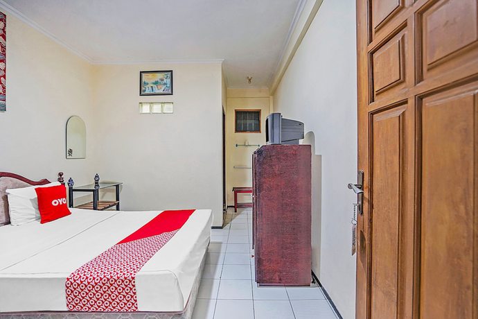 Imagen de la habitación del Hotel OYO 90132 Lie Mas. Foto 2