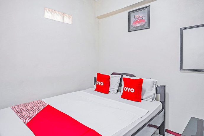 Imagen de la habitación del Hotel OYO 90132 Lie Mas. Foto 9