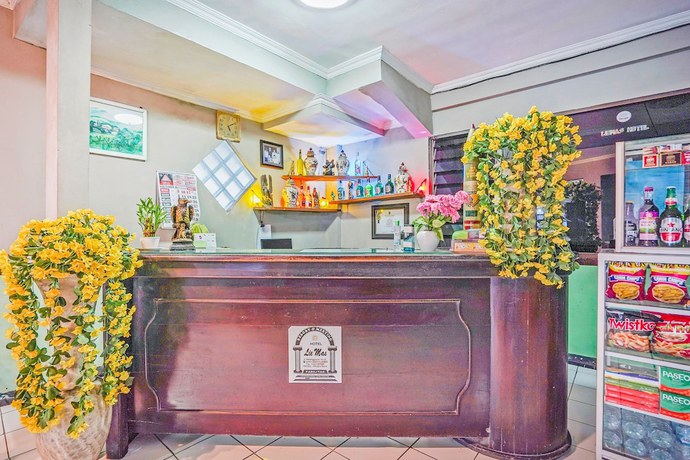 Imagen de los interiores del Hotel OYO 90132 Lie Mas. Foto 19