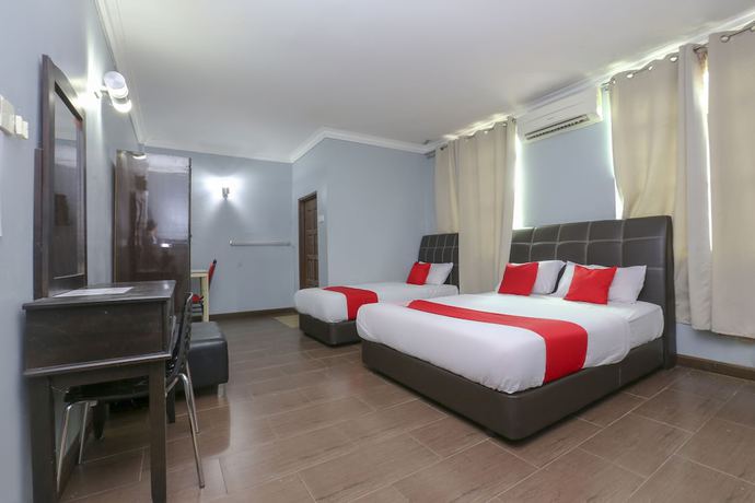 Imagen de la habitación del Hotel OYO 90145 D\'sofwa Inn. Foto 2