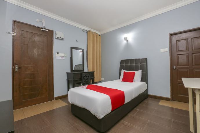 Imagen de la habitación del Hotel OYO 90145 D\'sofwa Inn. Foto 7