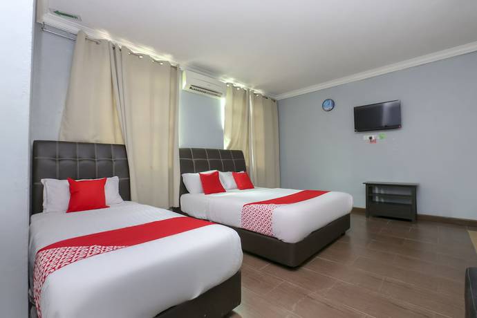 Imagen de la habitación del Hotel OYO 90145 D\'sofwa Inn. Foto 8