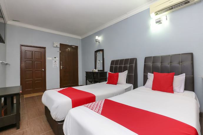 Imagen de la habitación del Hotel OYO 90145 D\'sofwa Inn. Foto 9