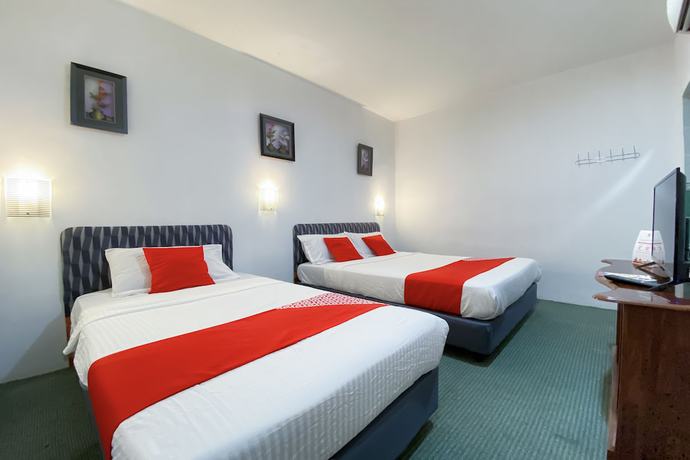 Imagen de la habitación del Hotel OYO 90148 Zee Lagenda. Foto 9