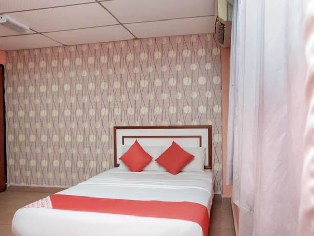 Imagen de la habitación del Hotel OYO 90167 Tiara. Foto 12