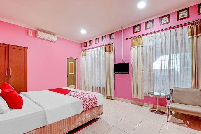 Imagen de la habitación del Hotel OYO 90218 Ubaran Guest House. Foto 5