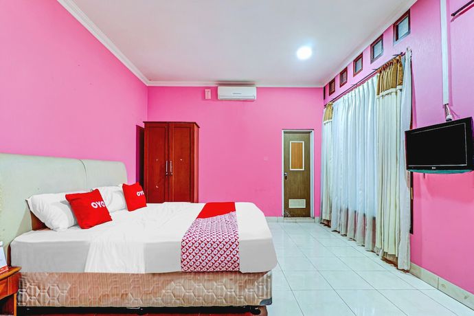 Imagen de la habitación del Hotel OYO 90218 Ubaran Guest House. Foto 6