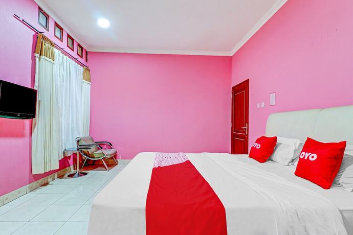 Imagen de la habitación del Hotel OYO 90218 Ubaran Guest House. Foto 7
