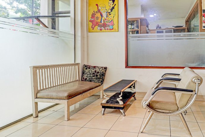 Imagen de los interiores del Hotel OYO 90218 Ubaran Guest House. Foto 18