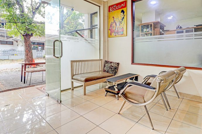 Imagen de los interiores del Hotel OYO 90218 Ubaran Guest House. Foto 19