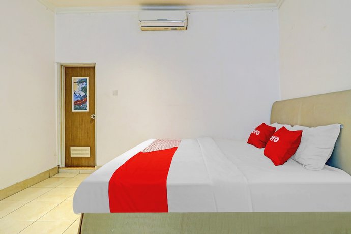 Imagen de la habitación del Hotel OYO 90218 Ubaran Guest House. Foto 10