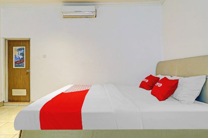 Imagen de la habitación del Hotel OYO 90218 Ubaran Guest House. Foto 11