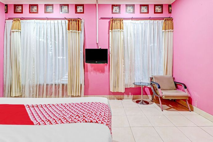 Imagen de la habitación del Hotel OYO 90218 Ubaran Guest House. Foto 13