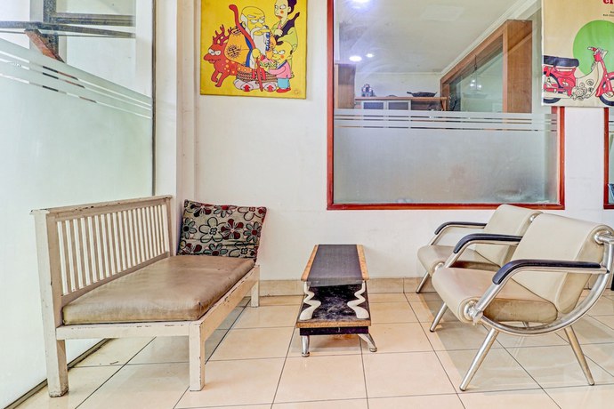 Imagen de los interiores del Hotel OYO 90218 Ubaran Guest House. Foto 20