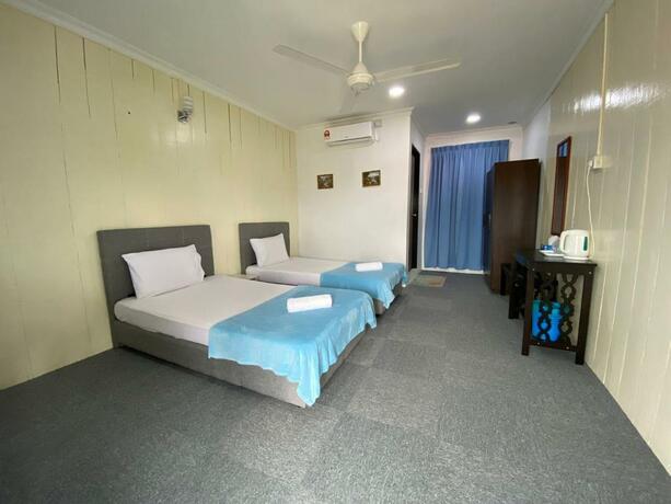 Imagen general del Hotel OYO 90230 Dh Residence. Foto 1