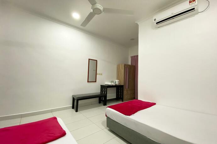 Imagen general del Hotel OYO 90230 Dh Residence. Foto 2