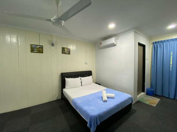 Imagen general del Hotel OYO 90230 Dh Residence. Foto 11