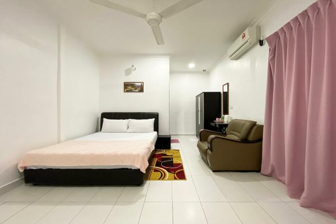 Imagen general del Hotel OYO 90230 Dh Residence. Foto 14
