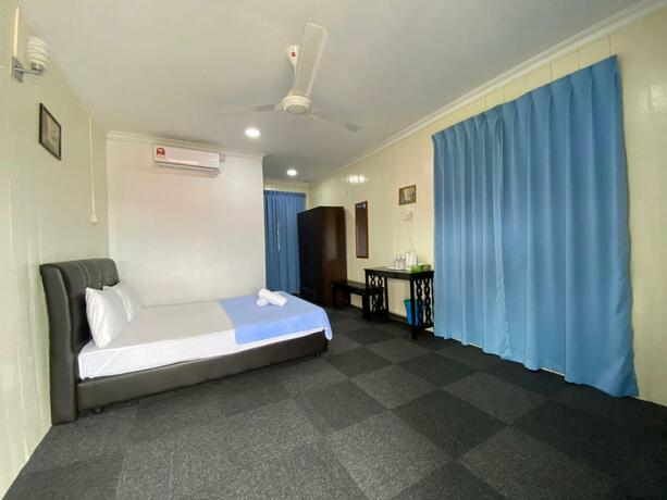 Imagen general del Hotel OYO 90230 Dh Residence. Foto 15