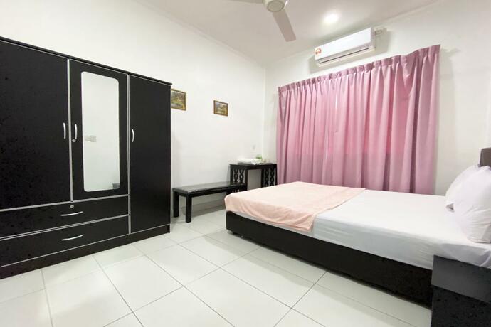 Imagen general del Hotel OYO 90230 Dh Residence. Foto 45