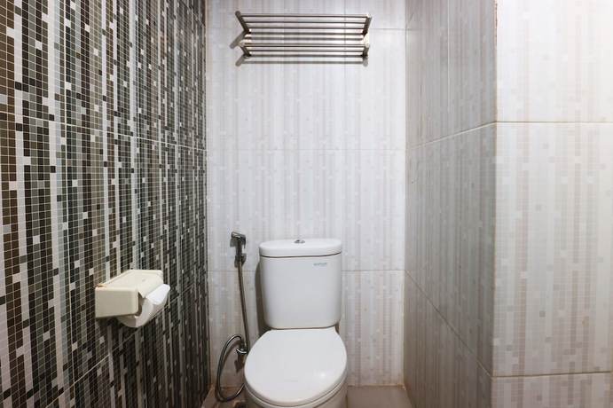 Imagen de la habitación del Hotel OYO 90244 Hotel Antara. Foto 5