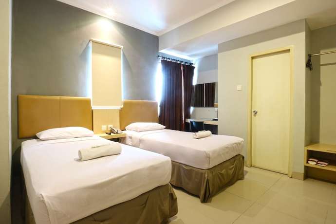 Imagen de la habitación del Hotel OYO 90244 Hotel Antara. Foto 8