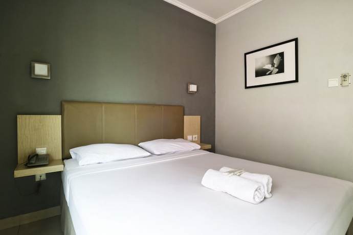 Imagen de la habitación del Hotel OYO 90244 Hotel Antara. Foto 9
