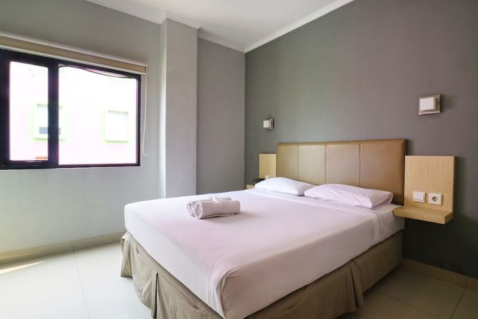 Imagen de la habitación del Hotel OYO 90244 Hotel Antara. Foto 12
