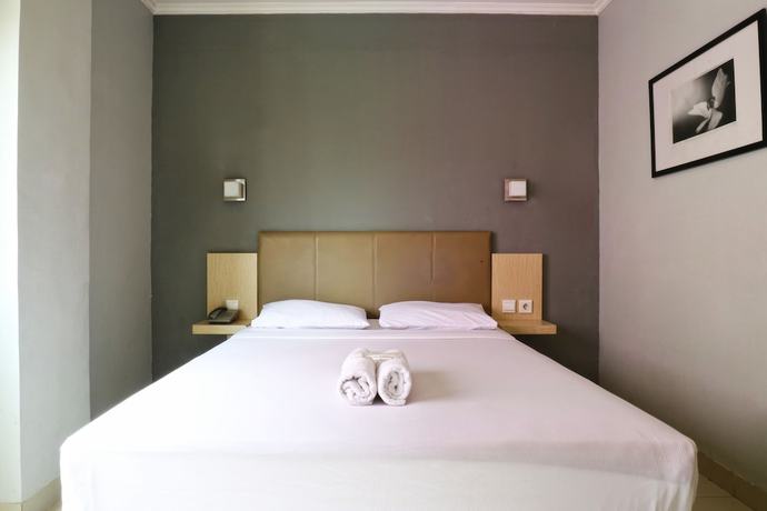 Imagen de la habitación del Hotel OYO 90244 Hotel Antara. Foto 13