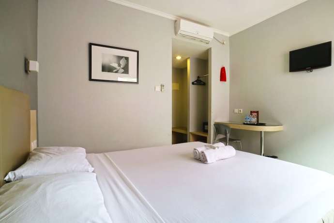 Imagen de la habitación del Hotel OYO 90244 Hotel Antara. Foto 16