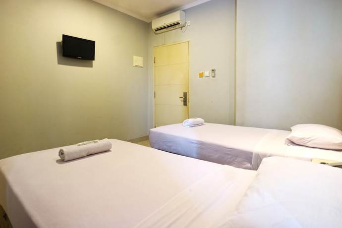 Imagen de la habitación del Hotel OYO 90244 Hotel Antara. Foto 18