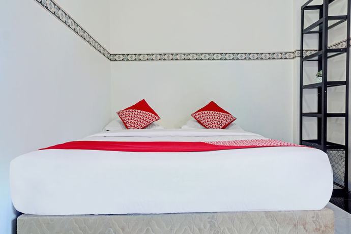 Imagen de la habitación del Hotel OYO 90260 Bumi Merpati Residence. Foto 4
