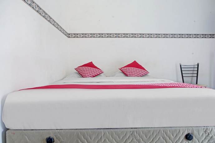 Imagen de la habitación del Hotel OYO 90260 Bumi Merpati Residence. Foto 5